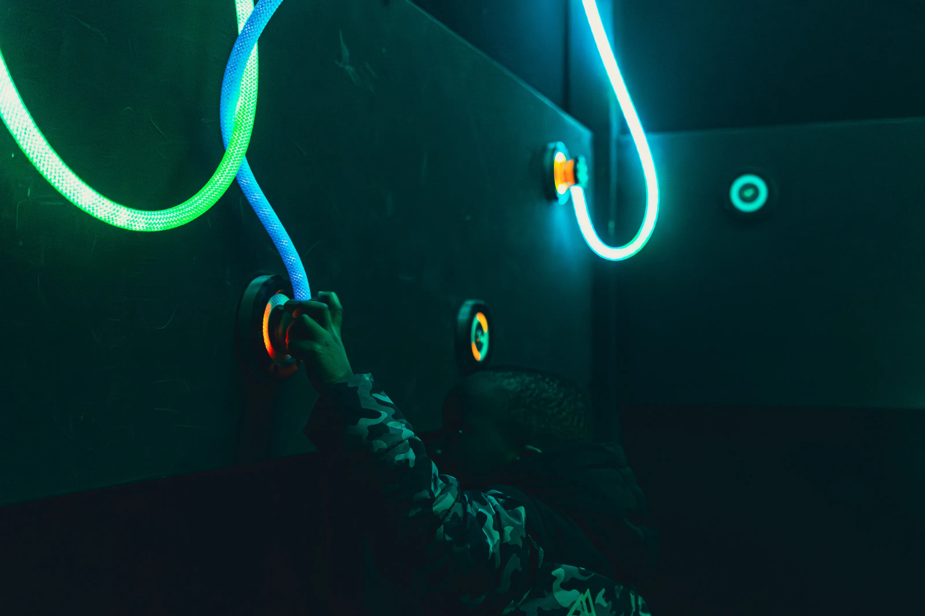 A child plays with the cable game